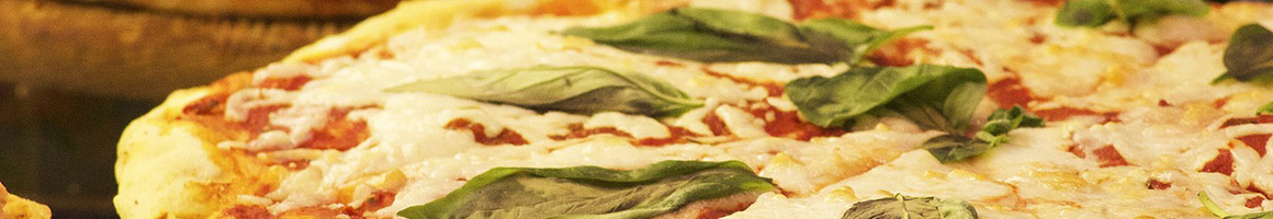 Eating Italian Pizza at Comella's Restaurants Belmont restaurant in Belmont, MA.
